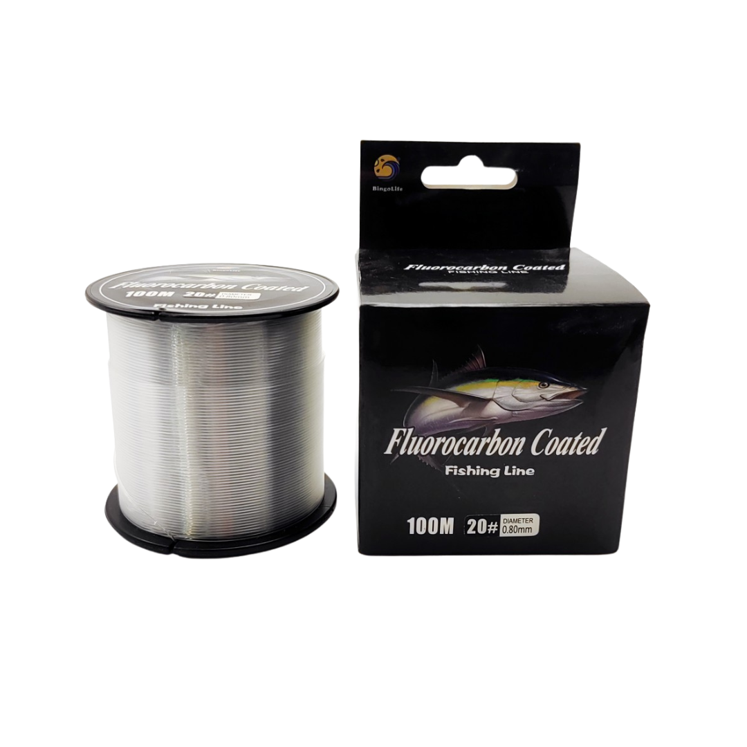 Detailed shot of metallic fishing reel spool with gold rim accents and fishing thread